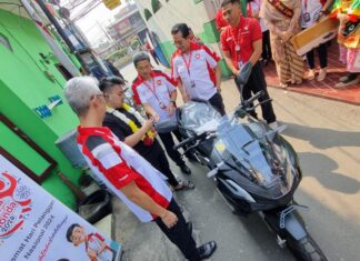 Manajemen AHM dan Astra Motor Blusukan Sapa Konsumen di Harpelnas 2024